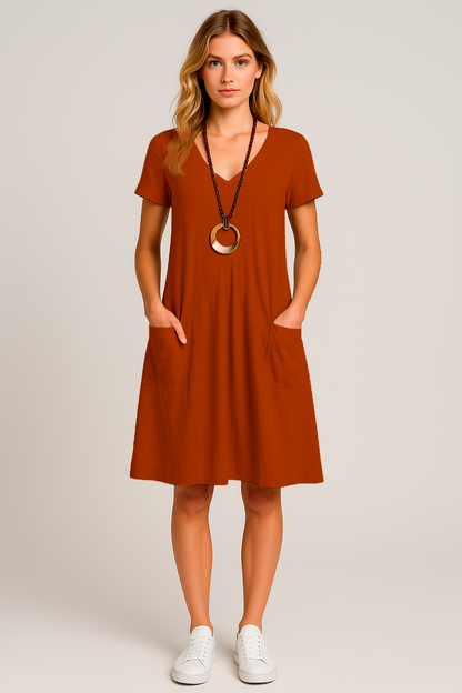 Vestido Lavínia Midi Decote Redondo Bolsos Frontais e  Manga Curta